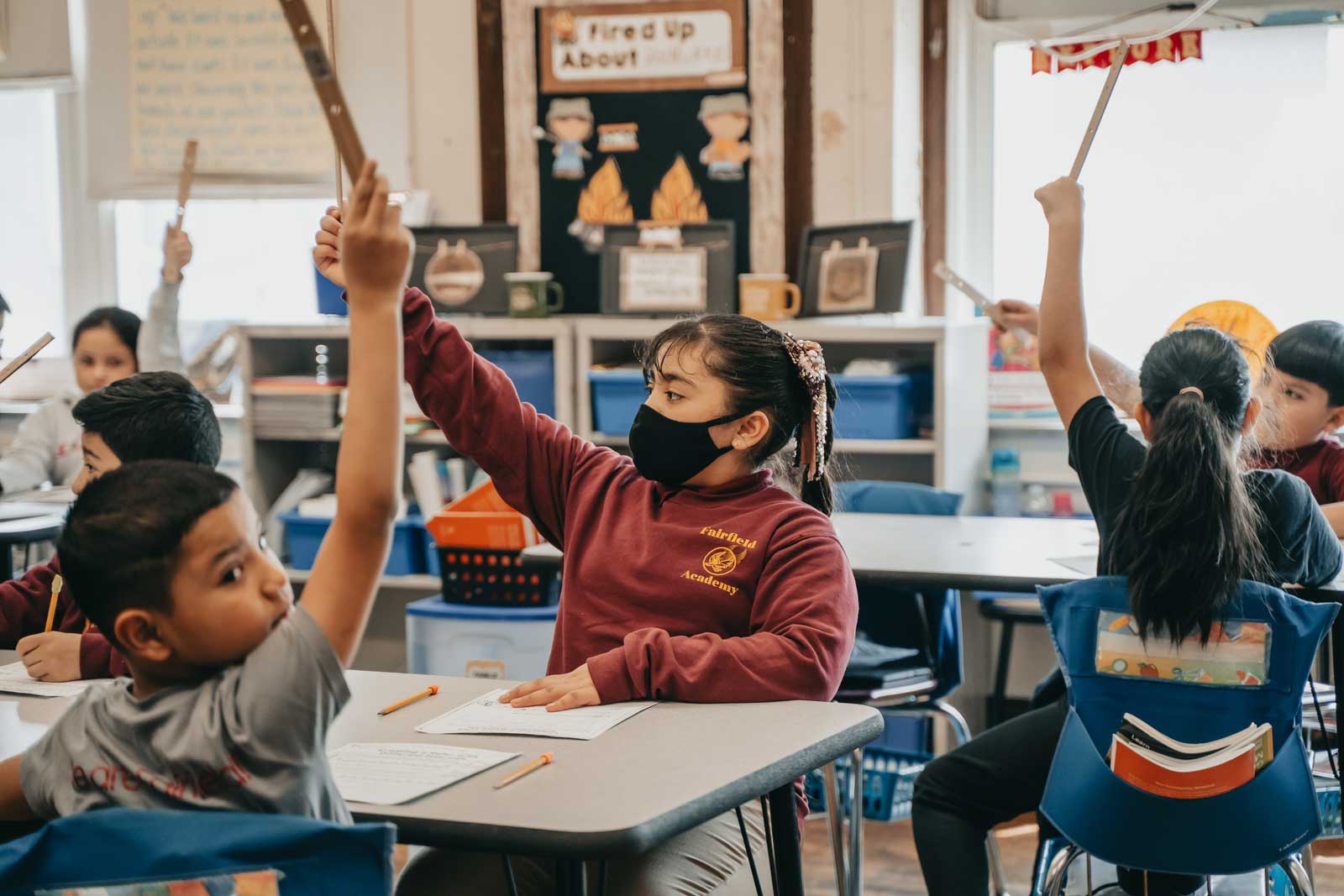 Fairfield-student-raising-hands